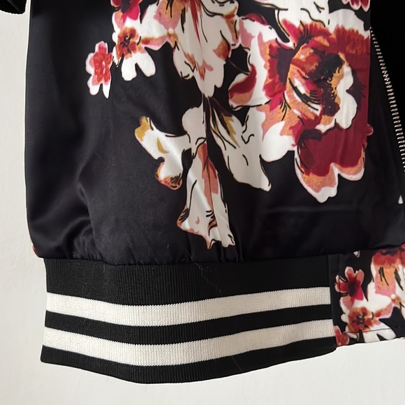 Sports-style satin-feel jacket with floral pattern and elastic striped details - Picture 3 of 5